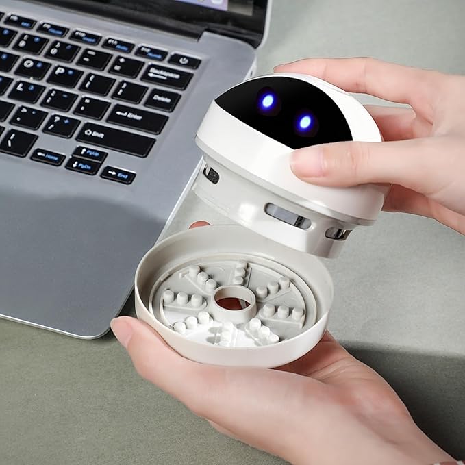 Desktop Vacuum Cleaner Mini,Cordless & Portable,Dust & Crumb Sweeper,Cute Cartoon Robot,USB,Easy to Remove Dust/Hair/Pet Hair/Crumbs on Desktop/Table/Keyboard/Sofa and etc,Lightweight Design