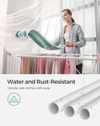 SONGMICS Clothes Drying Rack, with Sock Clips, Metal Laundry Rack, Foldable, Space-Saving, Free-Standing Airer, with 2 Height-Adjustable Gullwings, Indoor Outdoor Use, White and Pink ULLR052P01