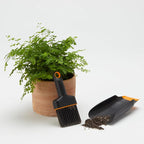 Fiskars Planting Soil Scoop & Brush Set, Dual-Sided Tool for Indoor Digging & Cleanup, Narrow Rigid End & Flexible Dustpan for Potting, Soft Bristles Sweep Debris, Recycled Plastic