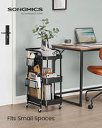 SONGMICS 3-Tier Storage Cart, Rolling Utility Cart, Metal Mesh Shelves, 2 Removable Pegboards, 2 Hanging Holders, 4 Hooks, Craft Cart for Living Room, Kitchen, Office, Bathroom, Ink Black ULRC037B01